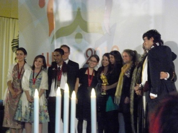 Looks like the awards for the top 10 on the speaker tab.  Trophy presumably being held by Joanna Connolly (1st), and two other of the Australian women (who took the top 4 awards) on the left, then the 5th place Canadian guy.  Hasan (10th) on right, holding Greg (6th) who is not visible in this photo.  The three ladies from Pakistan (7th), New Zealand (8th) and Scotland (9th) are presumably somewh